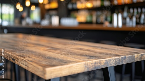 Bar interior with wooden counter and stools during the day