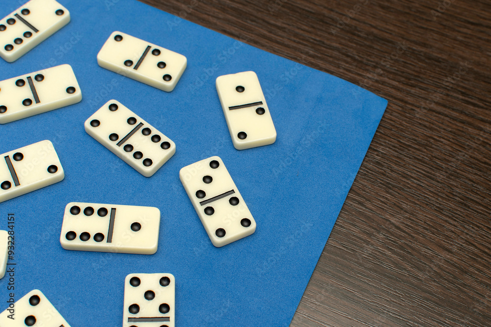 Dominoes bones on blue background	