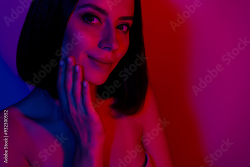 Photo of happy girl touch fingers face enjoy tender skin isolated neon colorful background