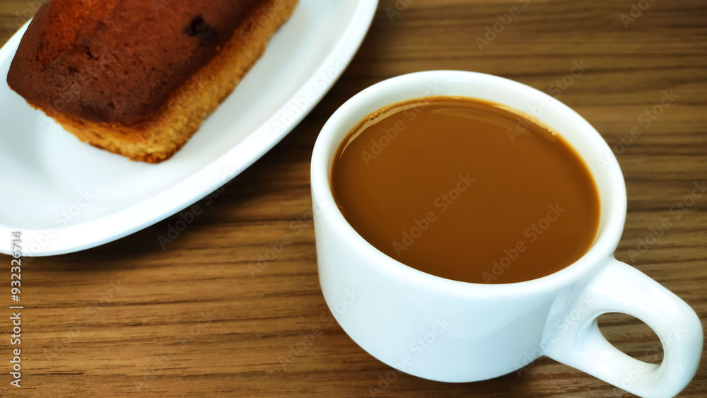 Εκτύπωση καμβά Cup of latte or coffee with milk also known as pingado in Brazil and wooden table