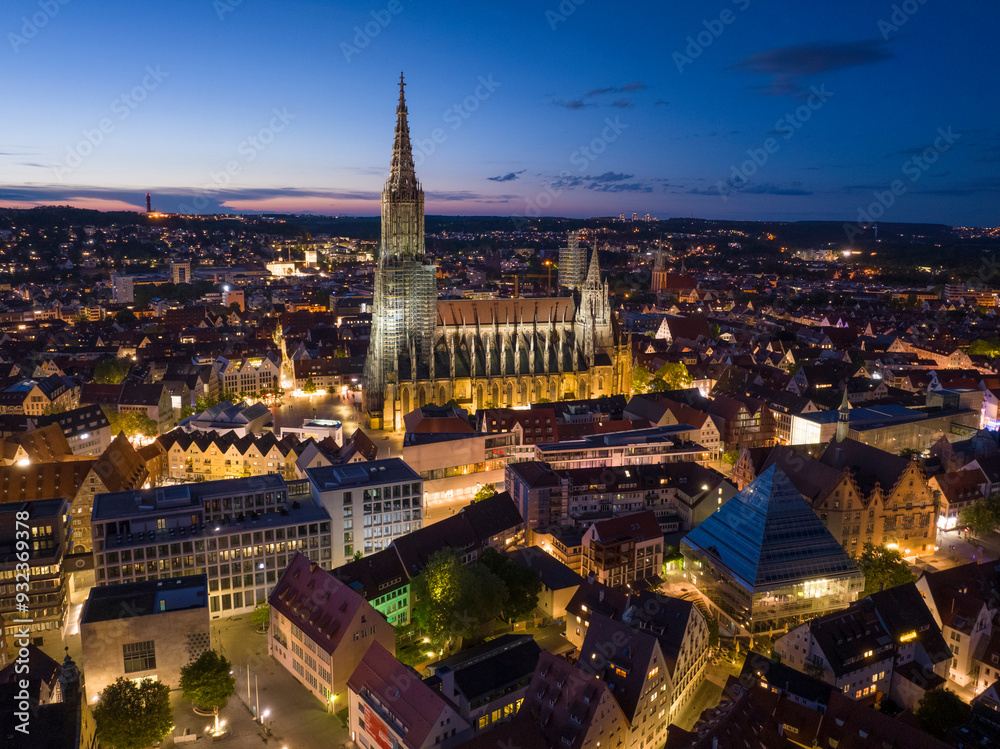 Ulm City in the evening Twilights Aerial Drone Shot. Baden-Wurttemberg, Germany. Illuminated Beautiful City at Night