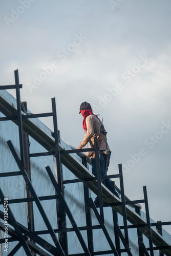 Wallpaper Mural Worker performs maintenance on outdoor billboard structures Torontodigital.ca
