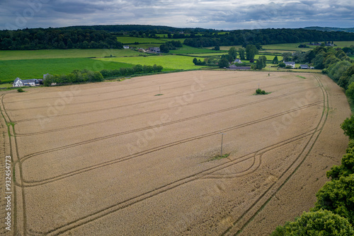 Aerial view of agricultural farmland in rural Wales on a stormy summer day photo