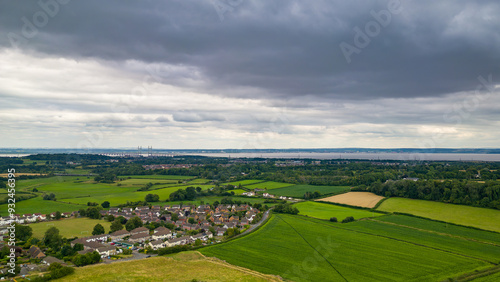 Aerial view of agricultural farmland in rural Wales on a stormy summer day photo