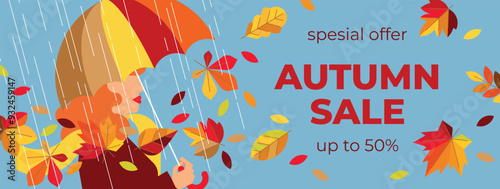 Bright creative background of autumn sale with red-haired girl walking in the rain with umbrella in hand. Beautiful catchy banner with colorful flying leaves and woman with umbrella. 