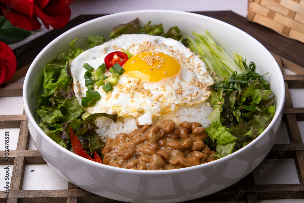 Bibimbap with natto, a Korean fusion dish Bibimbap with natto, a Korean fusion dish