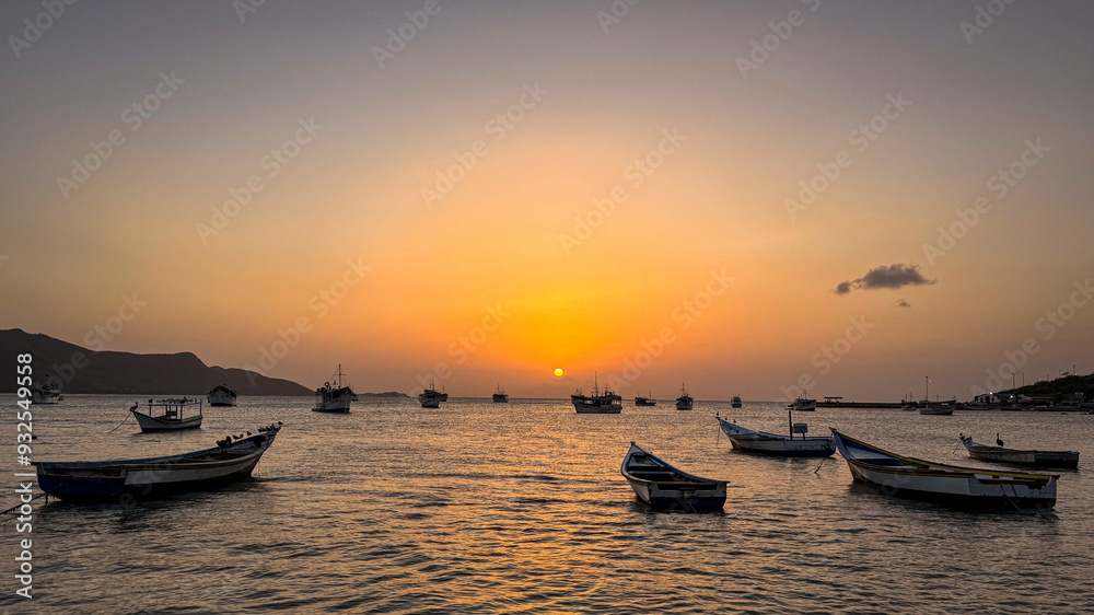 Fishing boats in Juan Griego Bay at sunset. Margarita Island, Nueva Esparta State. Venezuela Fishing boats in Juan Griego Bay at sunset. Margarita Island, Nueva Esparta State. Venezuela