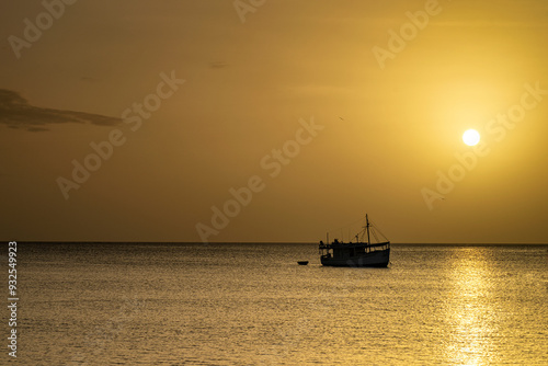 Obraz na płótnie Fishing boat in Juan Griego Bay at sunset. Margarita Island, Nueva Esparta State. Venezuela. w salonie