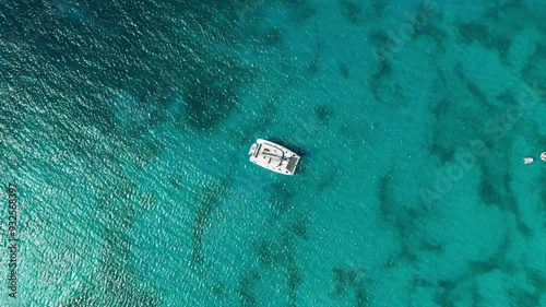 Ascending high over catamaran at Dead Man's Beach of Peter Island, BVI