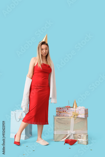 Young woman with hangover a...