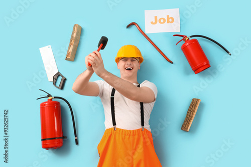 Male firefighter with equip...