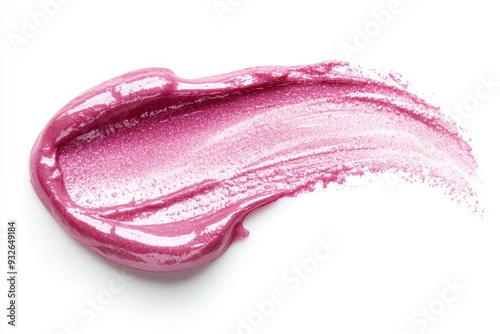 Smudged pink lip gloss on white background
