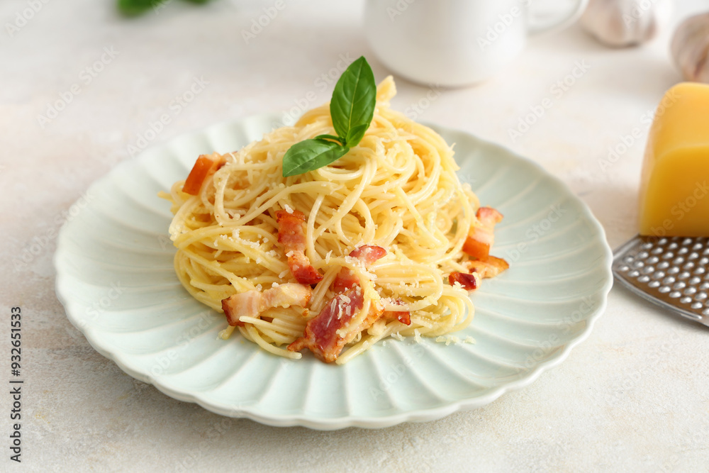 Plate with tasty pasta carbonara on light background, closeup Plate with tasty pasta carbonara on light background, closeup