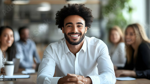 A smiling man in a business...