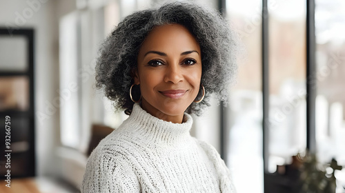 A smiling woman with curly ...