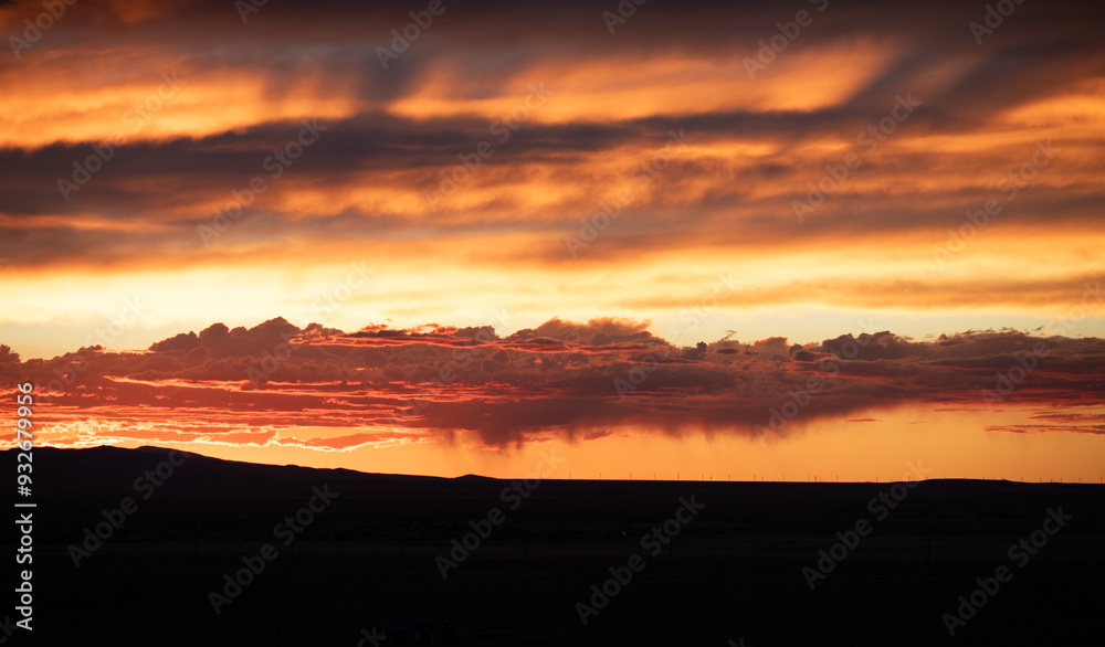 A sunset which reflects on clouds as in a lake of fire A sunset which reflects on clouds as in a lake of fire