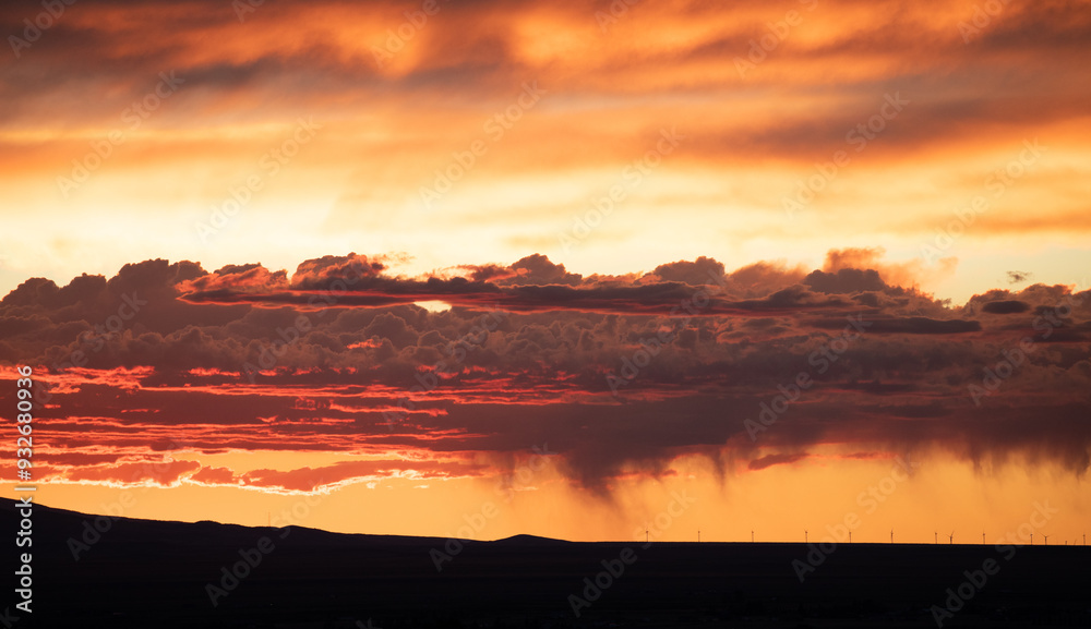 Stunning sunset over Wyoming plains -looks like there is a lake but it's an illusion Stunning sunset over Wyoming plains -looks like there is a lake but it's an illusion