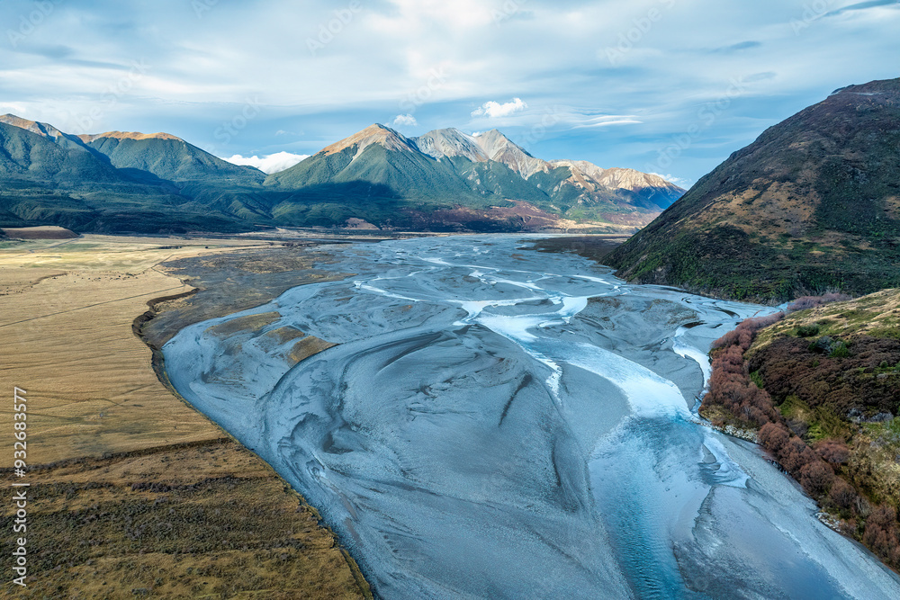 The braided Waimakariri river flowing through the rural Hawdon valley near Arthurs Pass