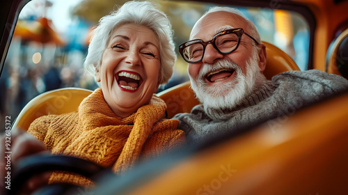 Elderly couple joyfully lau...