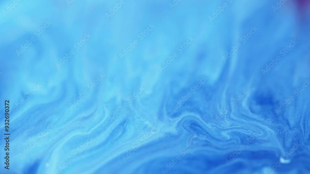 Paint wave. Blur background. Defocused blue color shimmering glitter marble texture acrylic emulsion stream flow motion abstract art.
