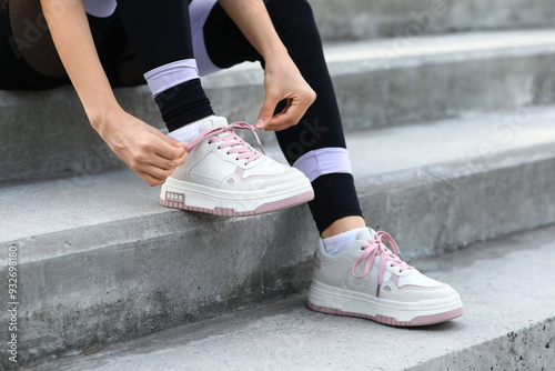Young woman in sportswear a...