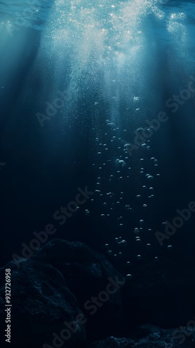 Sunlit Bubbles Rising in Deep Blue Ocean Depths, Illuminated by Sun Rays – Underwater World Loop, Underwater Background, Ocean Water Wallpaper, Underwater Scene with Rays of Light Vertical.