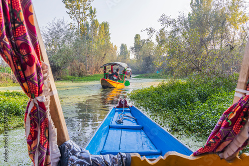 Rainawari, Srinagar, Jammu and Kashmir, India. Traditional shikara boats taking tourists on Dal Lake.