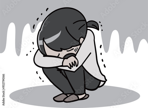 辛くてうずくまって泣く人