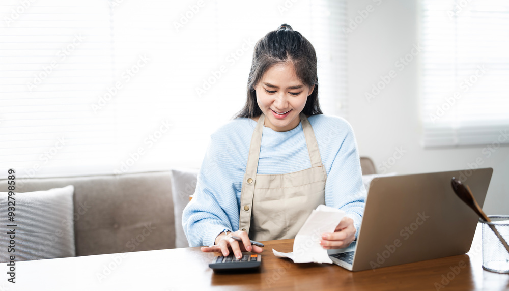 young woman calculating monthly home expenses, tax, bank account balance and credit card bills payment young woman calculating monthly home expenses, tax, bank account balance and credit card bills payment