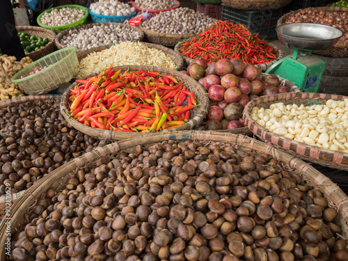 Vietnam, Hanoi, Old Quarter. Nuts, peppers, and other foods for sale. photo