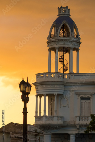 Cuba, Cienfuegos, Tower of Casa de Cultura in restored mansion at sunset. photo