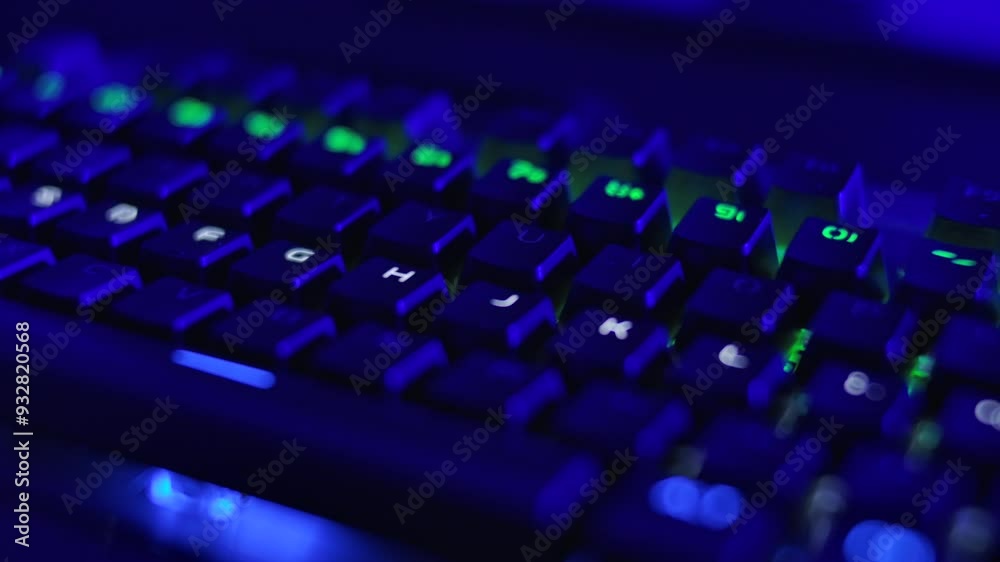 Gaming Keyboard With Rainbow of Colors Letters. PC RGB Keyboard is Glowing Neon Colors. Modern Backlit Keyboard With Pulsating RGB Colour Light. Cyber Sport Illuminated Mechanical Gaming Keyboard. Gaming Keyboard With Rainbow of Colors Letters. PC RGB Keyboard is Glowing Neon Colors. Modern Backlit Keyboard With Pulsating RGB Colour Light. Cyber Sport Illuminated Mechanical Gaming Keyboard.