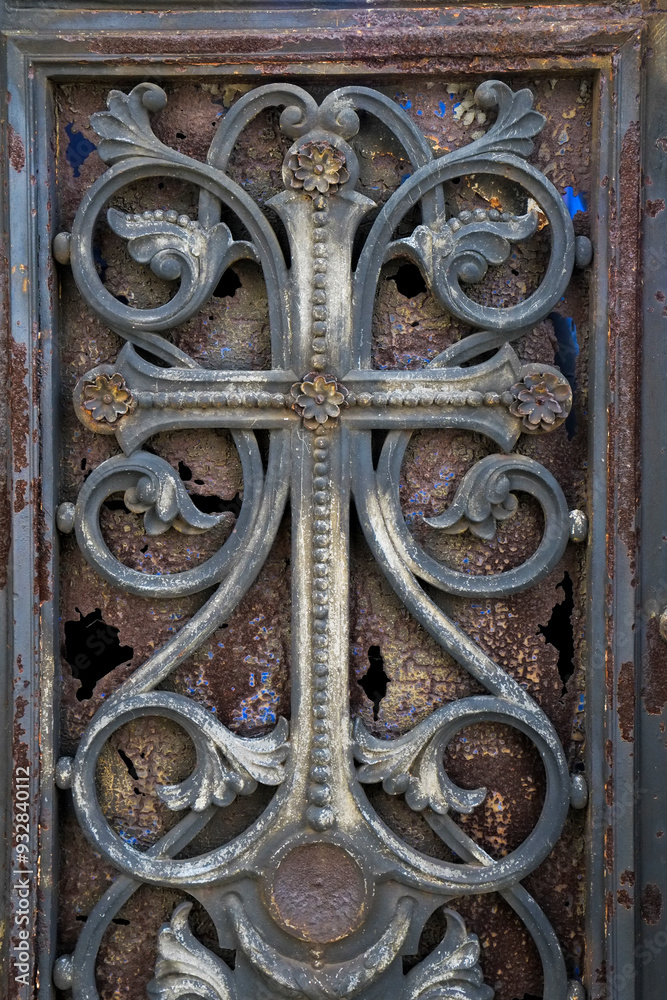 Paris, France. The famous Pere LaChaise Cemetery beautiful old metal work on door. Paris, France. The famous Pere LaChaise Cemetery beautiful old metal work on door.