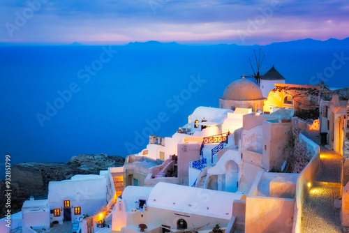 Europe, Greece, Santorini, Oia. Sunset on coastal town.