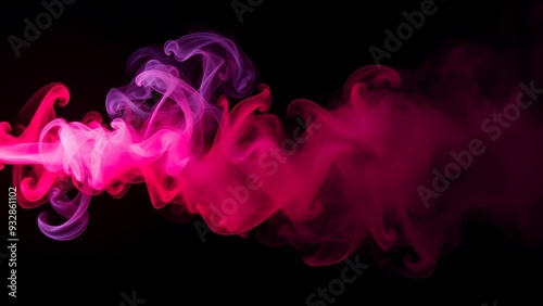 Colorful smoke swirling in the dark background creating a mesmerizing pattern