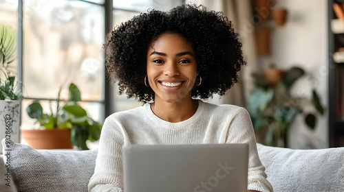 Happy woman with curly hair...