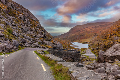 Narrow roadway over stone bridge at the Gap of Dunloe near Killarney, Ireland photo