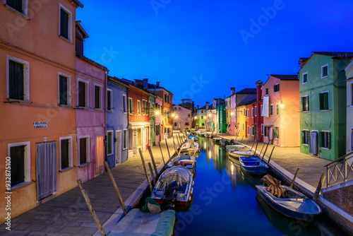 Europe, Italy, Burano. Colorful houses on canal at sunset.  photo