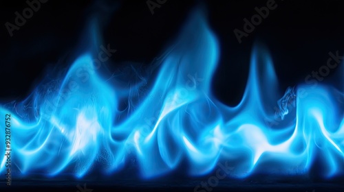 A close-up of natural gas flames, blue and intense, set against a black background. No people, copy space