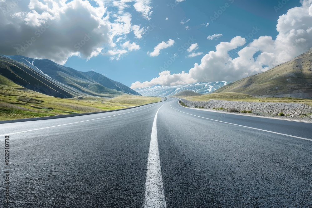 Road with asphalt mountains and cloudy sky Road with asphalt mountains and cloudy sky