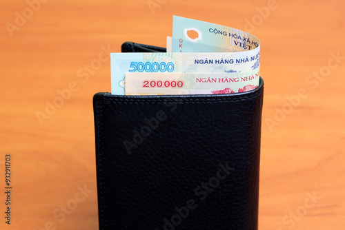 Vietnamese dong in the black wallet photo