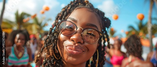 Black girl blows a kiss to camera at a festival