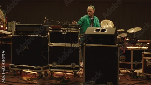 A jewish DJ and producer playing music in a synagogue