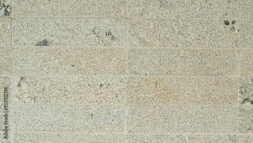 Detail of the texture of a mosaic of a grey-coloured stone paving stone floor.