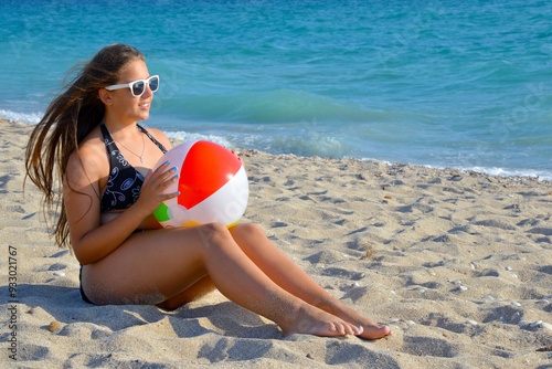 Toddler girl relaxing at beach