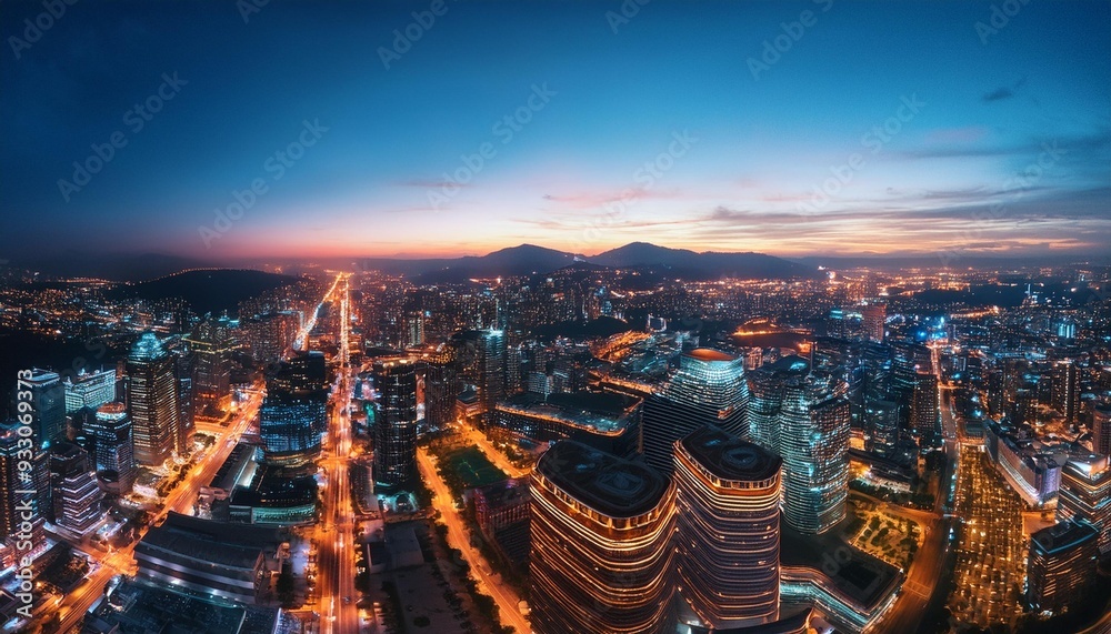 An aerial view of an illuminated urban night scene. An aerial view of an illuminated urban night scene.