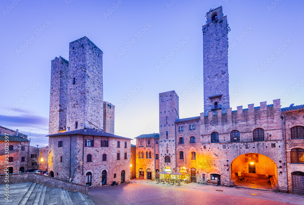 San Gimignano, Tuscany - Italy. Picturesque morning view of famous Piazza del Duomo and medieval towers.