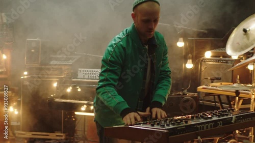 Jewish music producer playing various instruments in a church