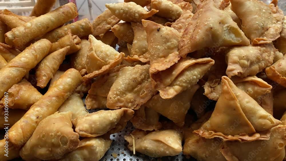 Chicken Rolls and Chicken Samosas in a Shop in Pakistan Famous Pakistani Local Street Food Chicken Rolls and Chicken Samosas in a Shop in Pakistan Famous Pakistani Local Street Food