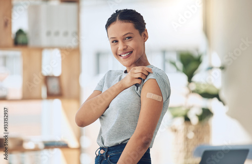 Happy woman, portrait and vaccine with plaster for healthcare, cure or recovery at home. Young female person with smile or bandaid on arm for vaccination, protection or medical injection at house